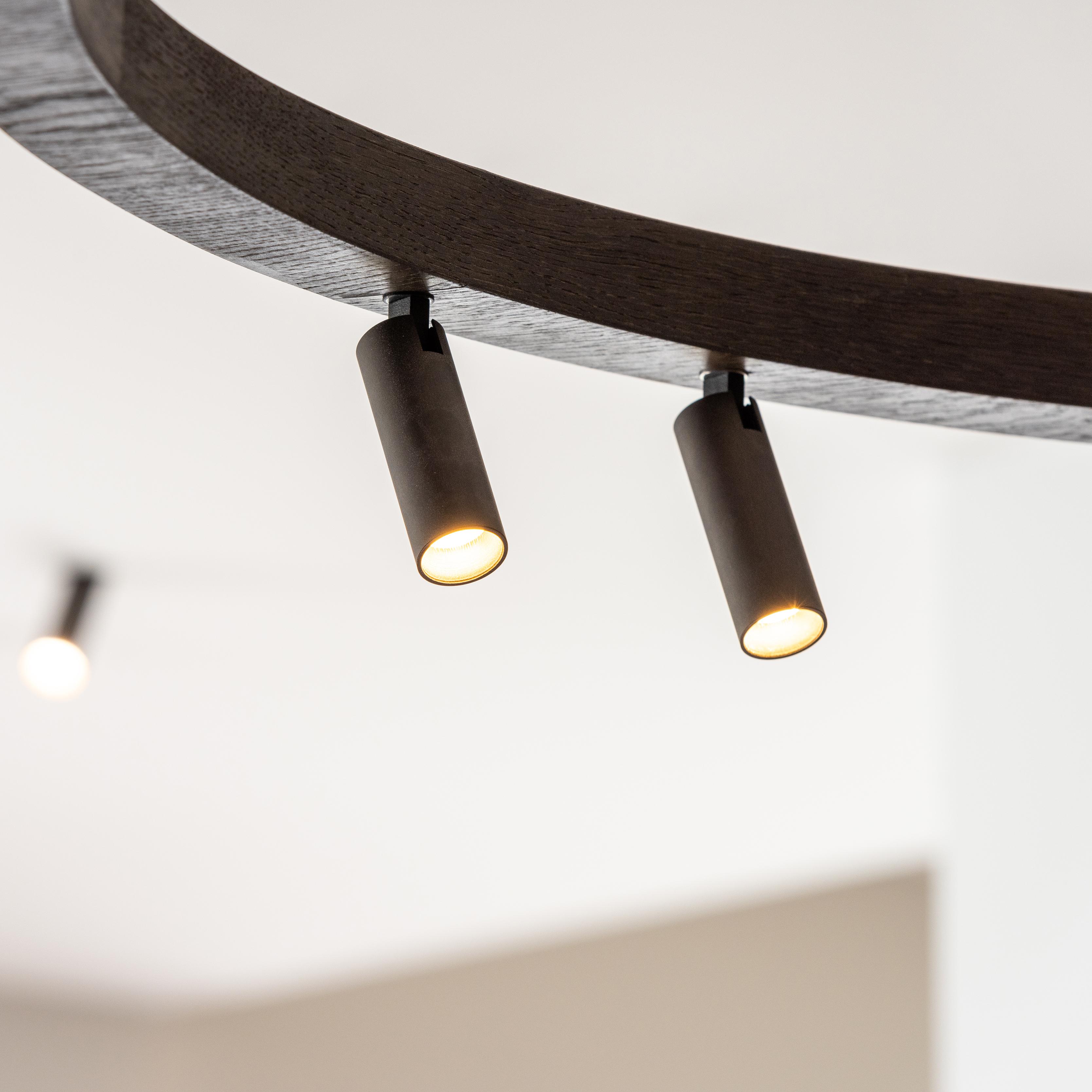 wood circle pendant 200cent Brick in the Wall